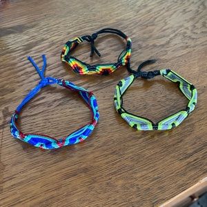 Three braided string bracelets